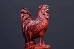 金鸡报晓 小叶紫檀老料一木镂空制作 【规格】长11cm 宽10cm 高23cm                 净重2.23斤 